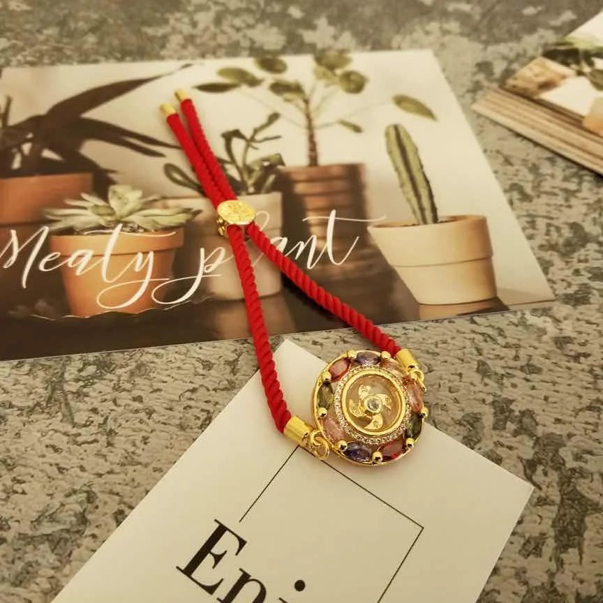 Longpo Temple breaks Tai Sui Red Rope Transfer Wheel Bracelet comes and goes when lucky. Bracelet can adjust men and women Qme