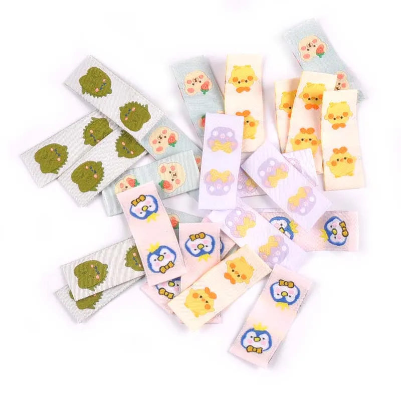 50Pcs Cartoon Dinosaur/Penguin Labels For Shoes Care Bags Sewing Garment Handmade Accessories DIY Crafts Fabric Clothing Tags Qme