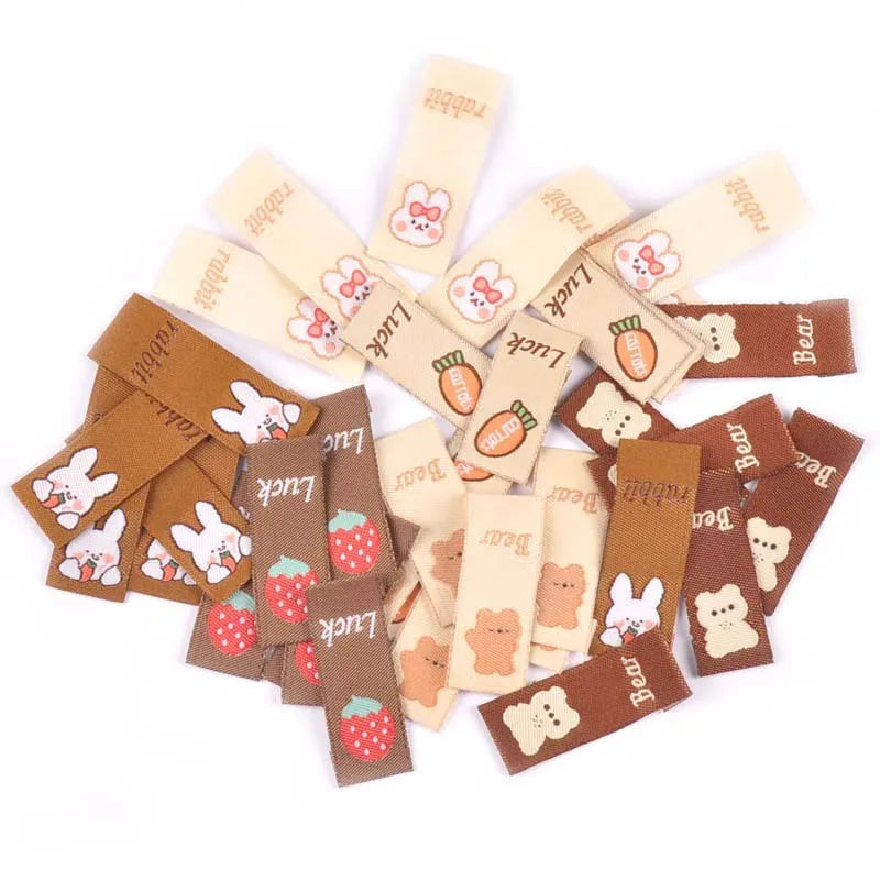 50Pcs Brown Cartoon Rabbit/Carrot Embroidery Labels For Sewing Accessories Care Bags Clothes Handmade Crafts Washable Tag c2890 Qme