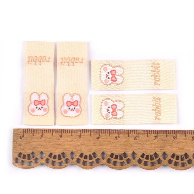 50Pcs Brown Cartoon Rabbit/Carrot Embroidery Labels For Sewing Accessories Care Bags Clothes Handmade Crafts Washable Tag c2890 Qme 5
