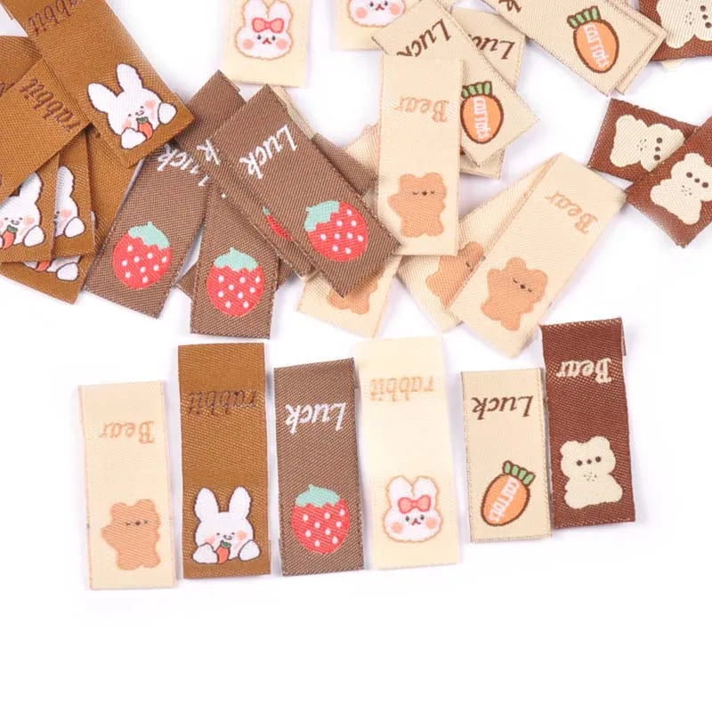 50Pcs Brown Cartoon Rabbit/Carrot Embroidery Labels For Sewing Accessories Care Bags Clothes Handmade Crafts Washable Tag c2890 Qme
