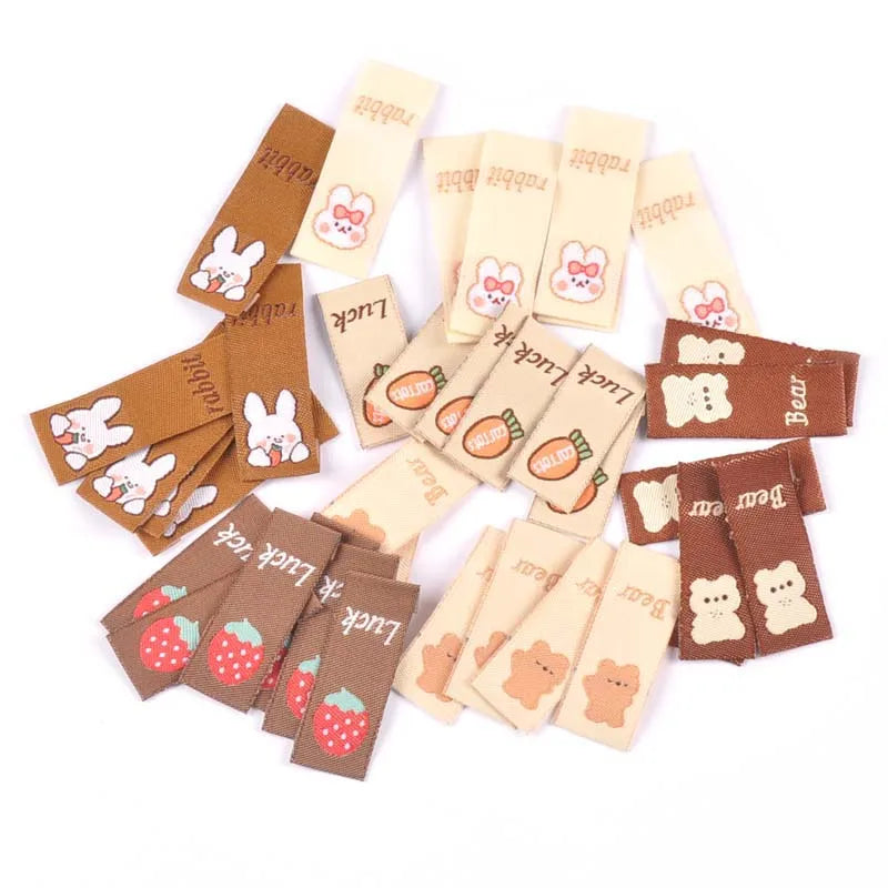 50Pcs Brown Cartoon Rabbit/Carrot Embroidery Labels For Sewing Accessories Care Bags Clothes Handmade Crafts Washable Tag c2890 Qme