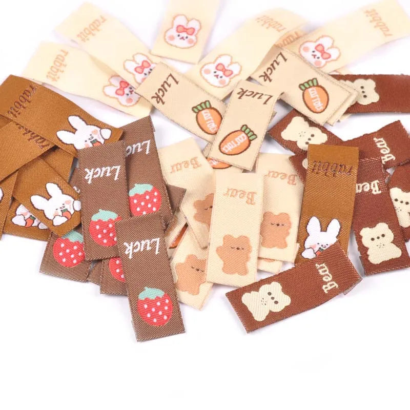 50Pcs Brown Cartoon Rabbit/Carrot Embroidery Labels For Sewing Accessories Care Bags Clothes Handmade Crafts Washable Tag c2890 Qme