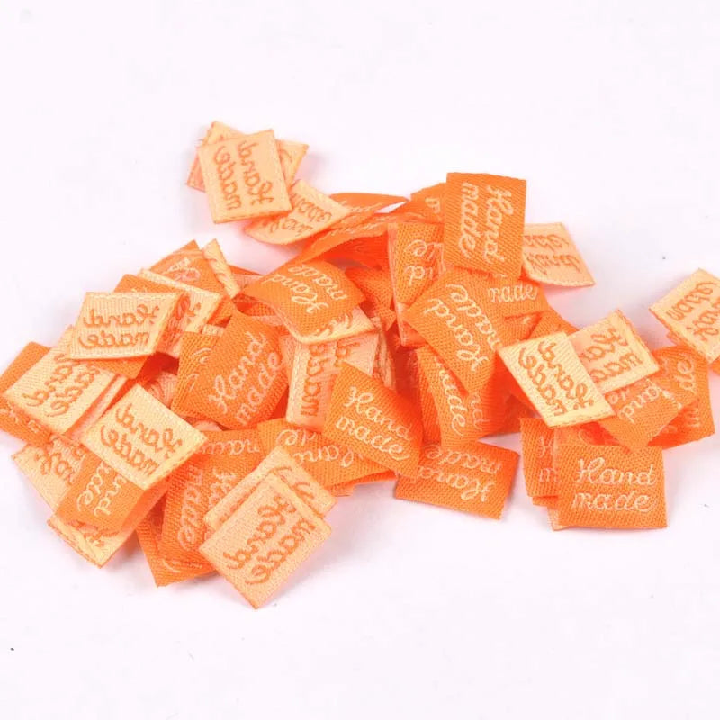 11x15mm Colorful Labels Sewing Supplies Handmade Clothing Tags Embossed Flag Label For DIY Garment Bags Accessories 100Pcs c2393 Qme