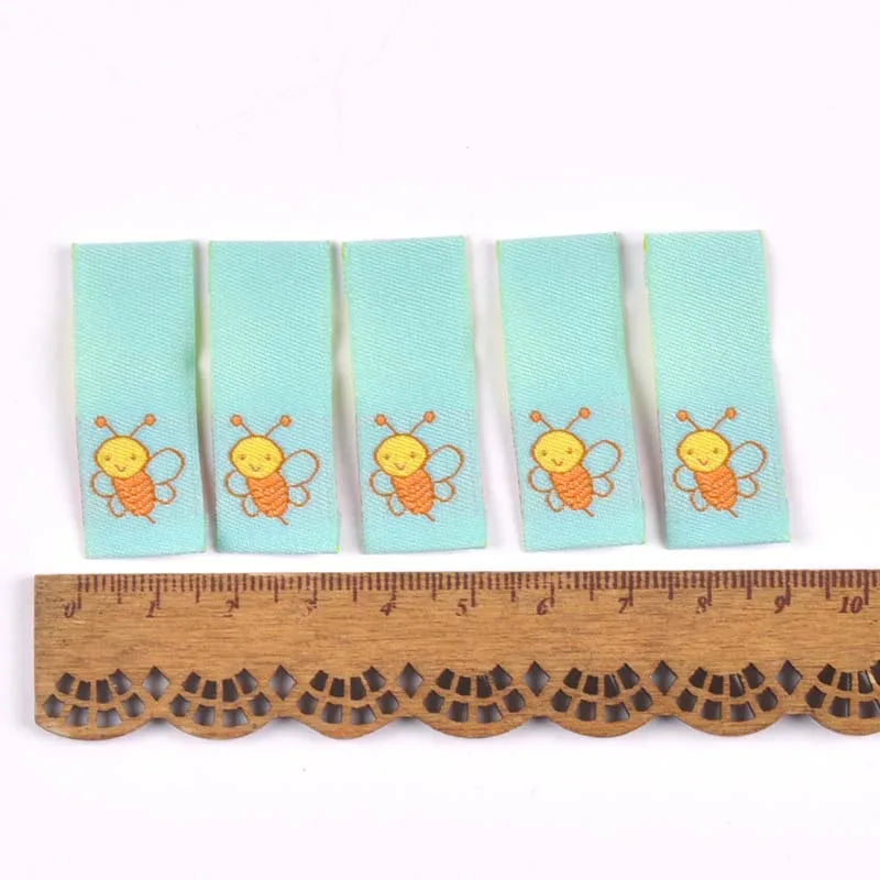 50Pcs 1.5x4cm Multicolor cute cartoon embroidery Clothes Labels For Sewing Accessories Garment Care Bags Tags Handmade Crafts Qme