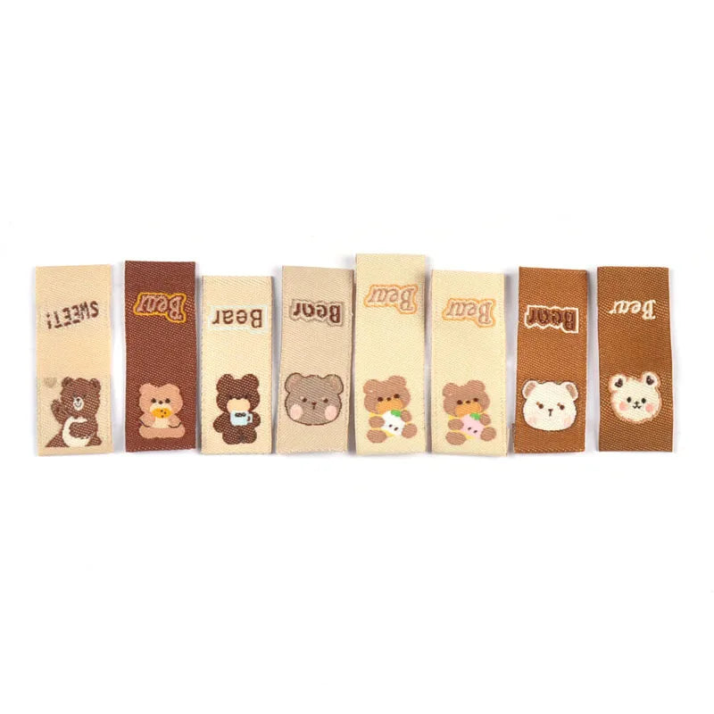 50Pcs Lovely Brown Bear Embroidery Labels For Sewing Accessories Bags Clothes Washable Care Tags Kids Garment Handmade DIY c3205 Qme