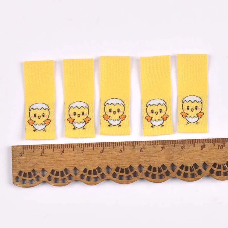 50Pcs 1.5x4cm Multicolor cute cartoon embroidery Clothes Labels For Sewing Accessories Garment Care Bags Tags Handmade Crafts Qme