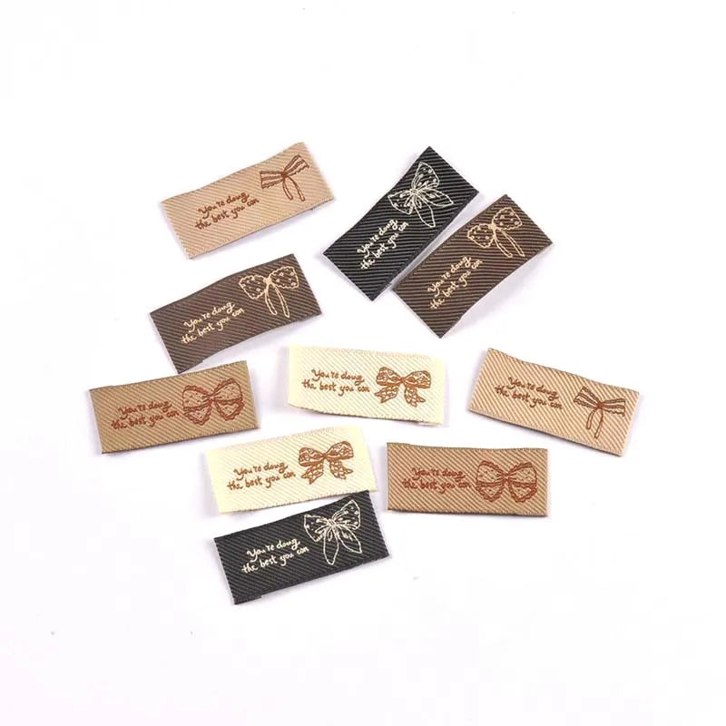 30pcs 44x20mm White/Black/Coffee Knitted Bow Label DIY Sewing Crafts Clothes for Headwear/Clothing/Shoes/Bags cp3841 Qme