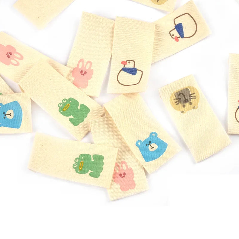 50pcs 20x40mm Cartoon Animals Printed Beige Label DIY Decor Clothes Backpack Supplies Sewing Accessories Handmade Crafts c4147 Qme