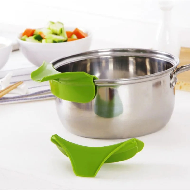 Kitchen Tools Designed to Prevent Spills, Including Pots with Round Openings, Edge Guards, And Various Small Kitchen Gadgets Qme