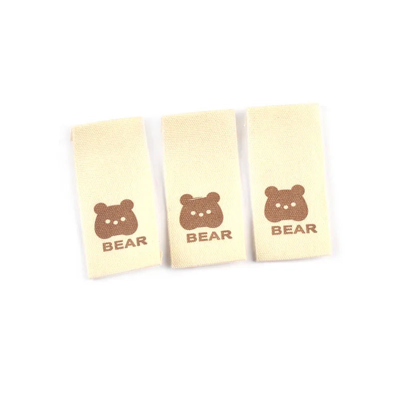 50pcs/lot 20x40mm Lovely Bear/Flower/Rabbit Printed Beige Label For DIY Decor Clothing Sewing Accessories Handmade Crafts c4146 Qme 1