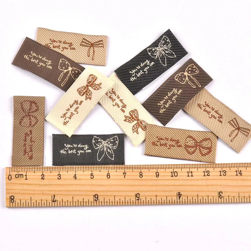 30pcs 44x20mm White/Black/Coffee Knitted Bow Label DIY Sewing Crafts Clothes for Headwear/Clothing/Shoes/Bags cp3841 Qme