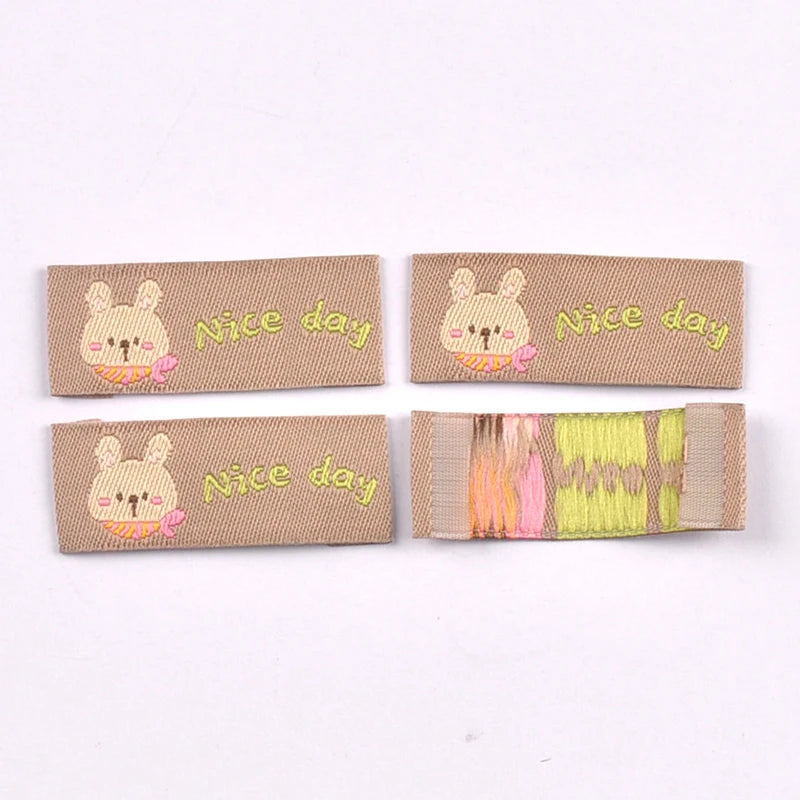 50Pcs Mix 40x17mm Cute Animal panda/dog/cat Fabric Labels Sew On Tags for DIY Clothes/Bag/Shoes Crafts cp4314 Qme 40x17mm-5