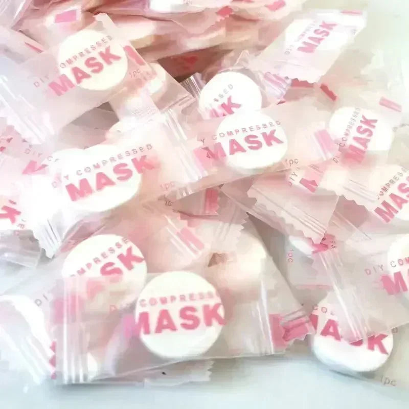 100pcs Disposable Compressed Facial Mask Portable Travel Non-woven Face Mask Skin Care Cotton Wrapped Masks Paper Qme silk 100 PCS