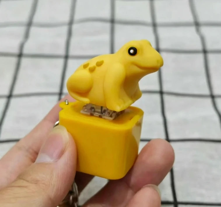 Rechargeable Croaking Frog Keyboard Fingertip Button Keychain LED Qme