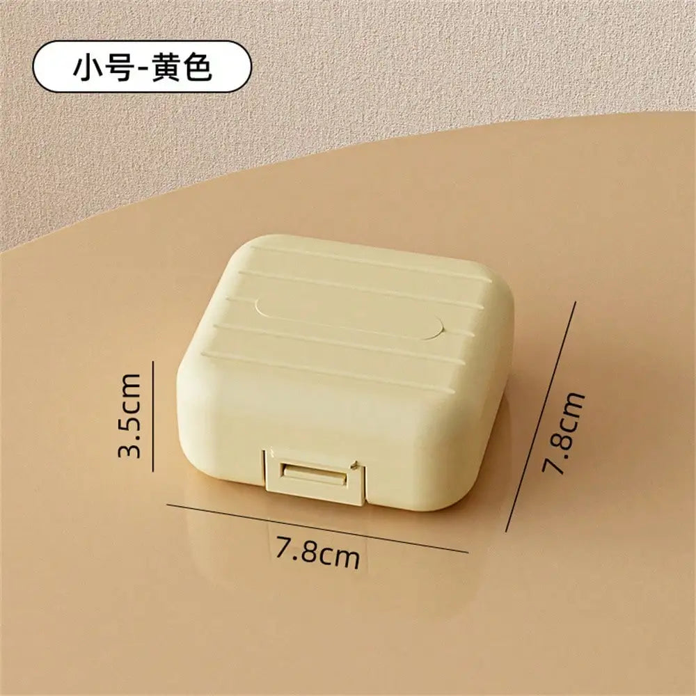 7-Compartment Portable Travel Mini Pill Case Waterproof Qme yellow