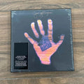 Rock Music 2CD Set with Artistic Palm Cover, Anniversary Collector's Edition with Full High-Quality Tracks for Music Enthusiasts Qme Living in the Materi