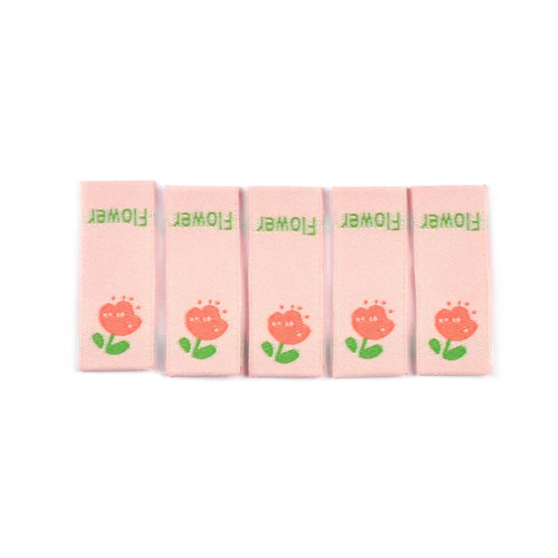 50pcs 3.9x1.5cm Cartoon Flower Embroidery Cloth Labels For Sewing Clothes Accessories DIY Crafts Supplies Washable Kids Bag Tags Qme 2