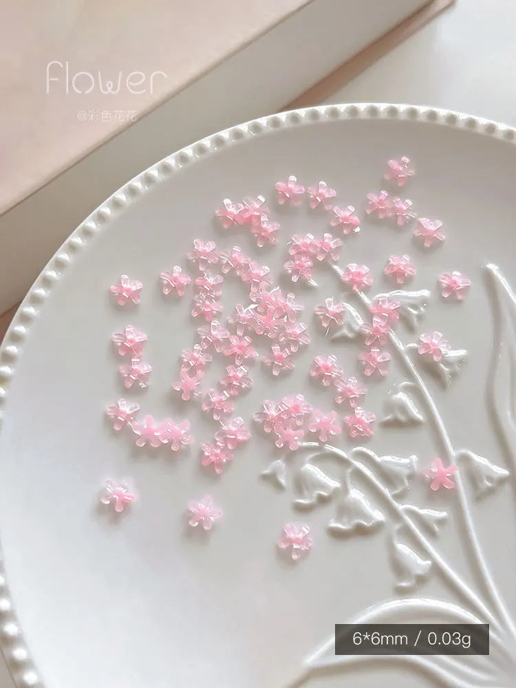 Sparkling White 5 Petal Flower Nail Charms, 3D Resin Small Flat Back Daisy Nail Art Decorations, Bling DIY Manicure Rhinestones Qme pink 6mm 50pcs