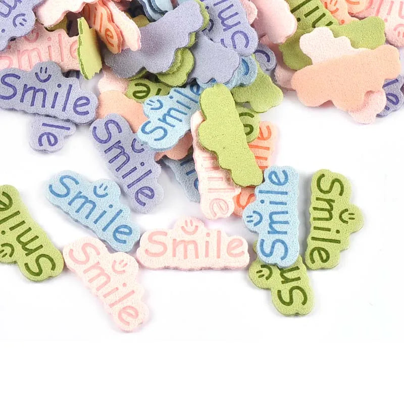 30pcs 14.5x29mm Smile Letter Embossed Leather Labels For Clothes Sewing Accessories DIY Bag Kid Garment Craft Handmade Tag C3707 Qme