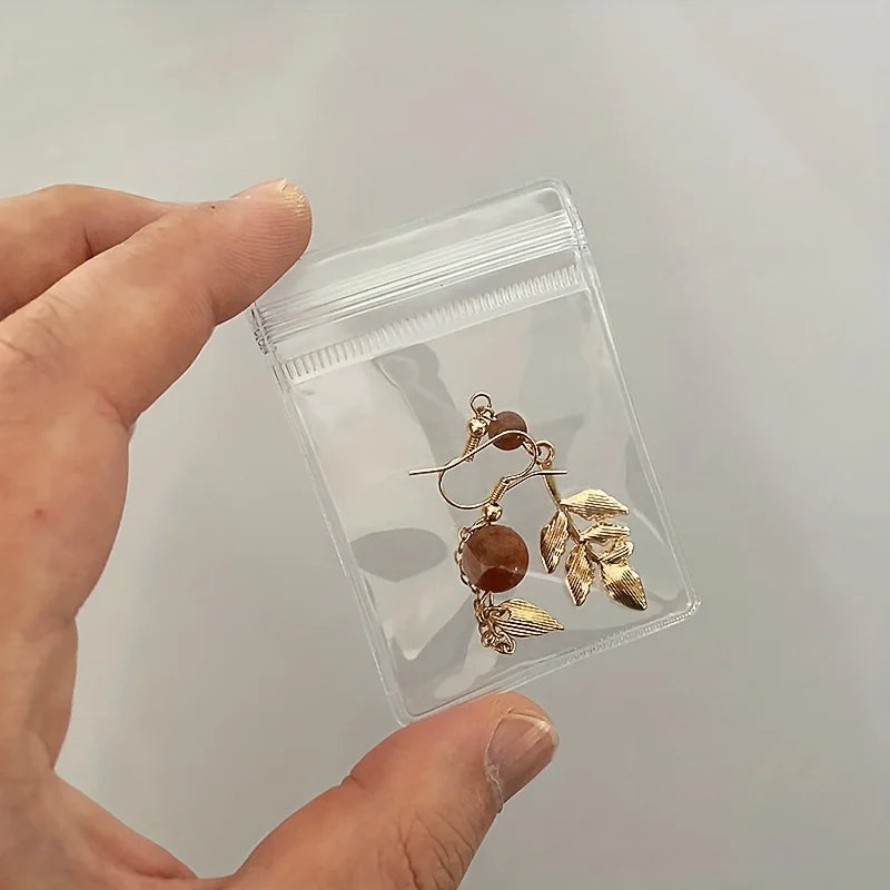 100 pieces in transparent jewelry bag, sealed bag, earrings, earrings, jewelry storage bag, small packaging bag Qme