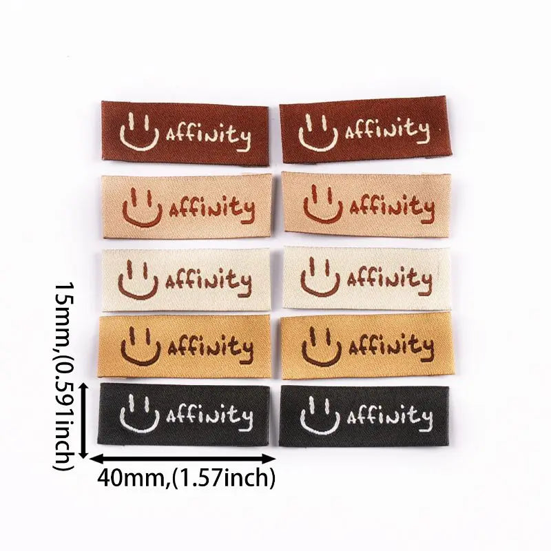 50pcs 15×40mm Colorful smiling face Face Pattern Embroidery Label Overlock DIY Clothing Handmade Accessories Without Gum cp3877 Qme