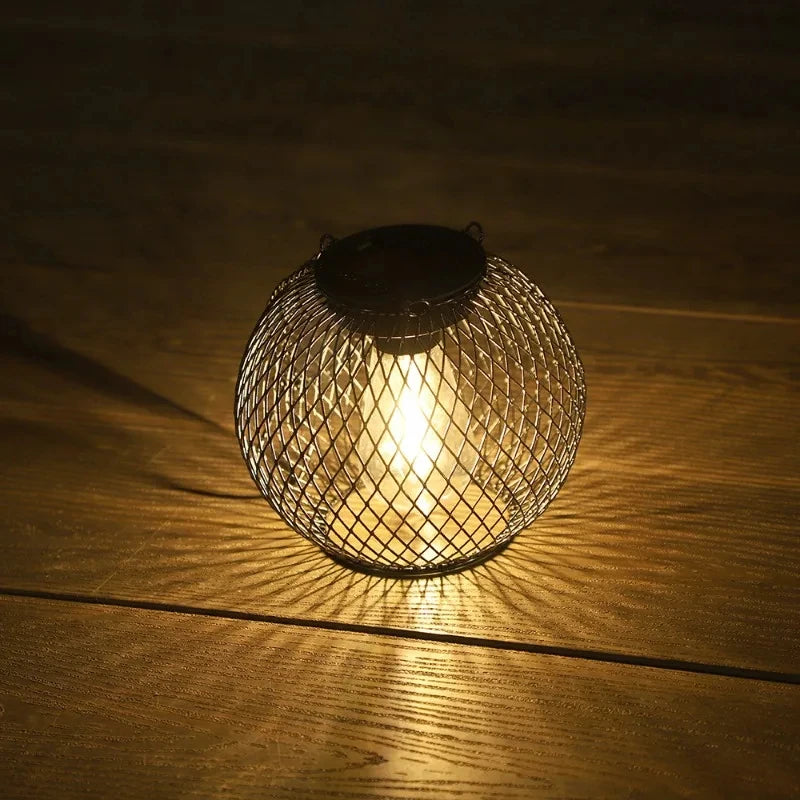 Solar wrought iron lantern lamp retro net chandelier outdoor garden decoration hollow lantern Qme