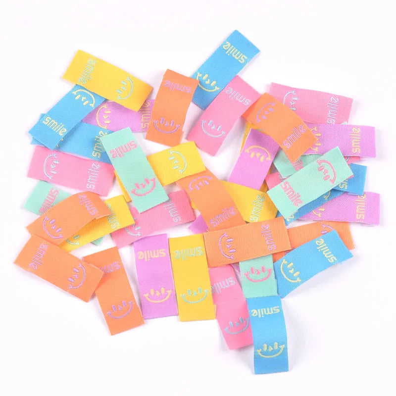 50Pcs Colorful Smile Embroidery Colth Labels Garment Washable Care Tags Sewing Accessories Crafts DIY Knitting Bag Shoe Supplies Qme