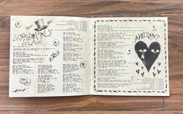 Avant-Garde Dark CD Album, Gothic-Infused Alternative Pop with Dramatic Production, Emotional Vocals and Ethereal Storytelling Qme