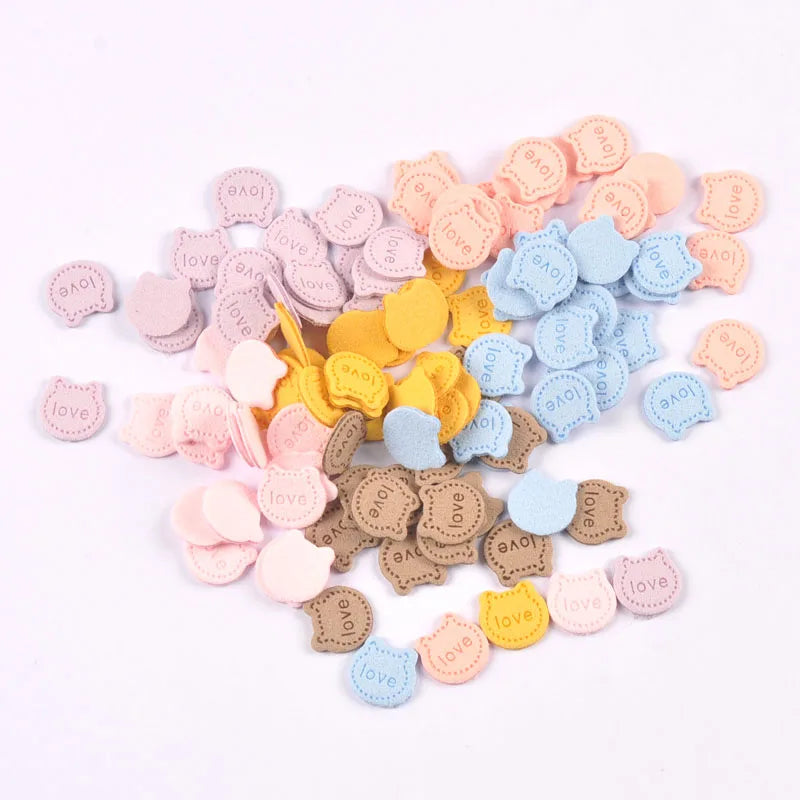 50Pcs Love Letter Cat Embossing Leather Labels For Clothes Sewing Accessories Garment DIY Crafts Supplies Kid Hats Shoes Tags Qme