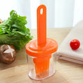 A silicone oil brush with bottle for kitchen baking and grilling Qme Orange