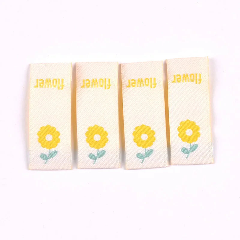 50pcs Cute Flower Embroidery Labels DIY Garment Accessories Handmade Clothing Bag Shoes Tags Kids Sewing Crafts 41x15mm c3630 Qme 1