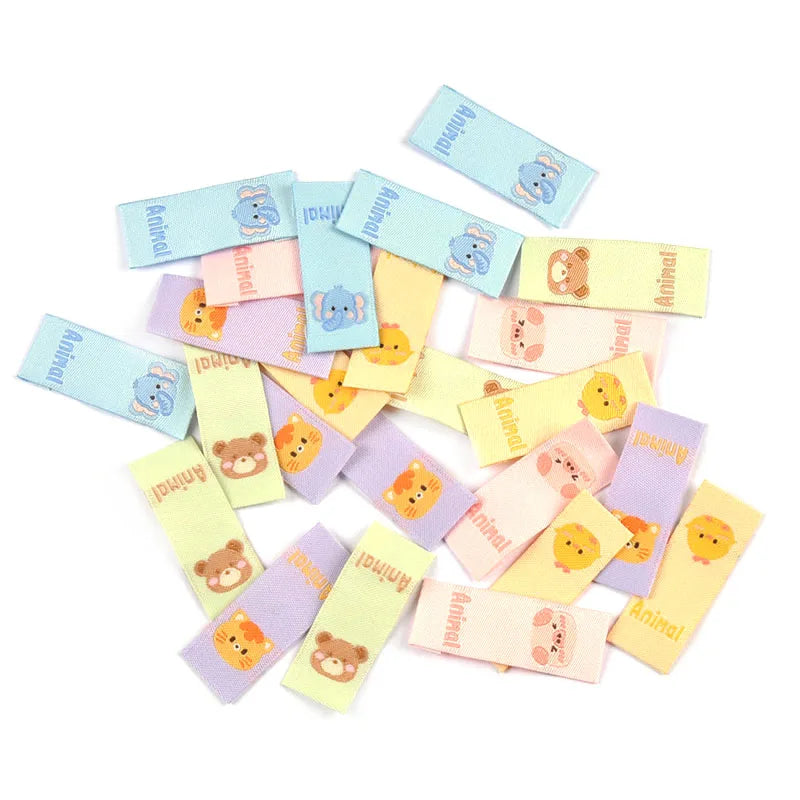 50pcs 39x15mm Kawaii Cartoon Piggy/Bear/Chick Embroidery Labels Kid Clothes Tags Sewing Accessories DIY Crafts Handmade Supplies Qme