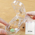 One Compact And Portable Pill Organizer Featuring a Built-In Splitter, Design, And Comes with an OPP Bag. Qme Transparent