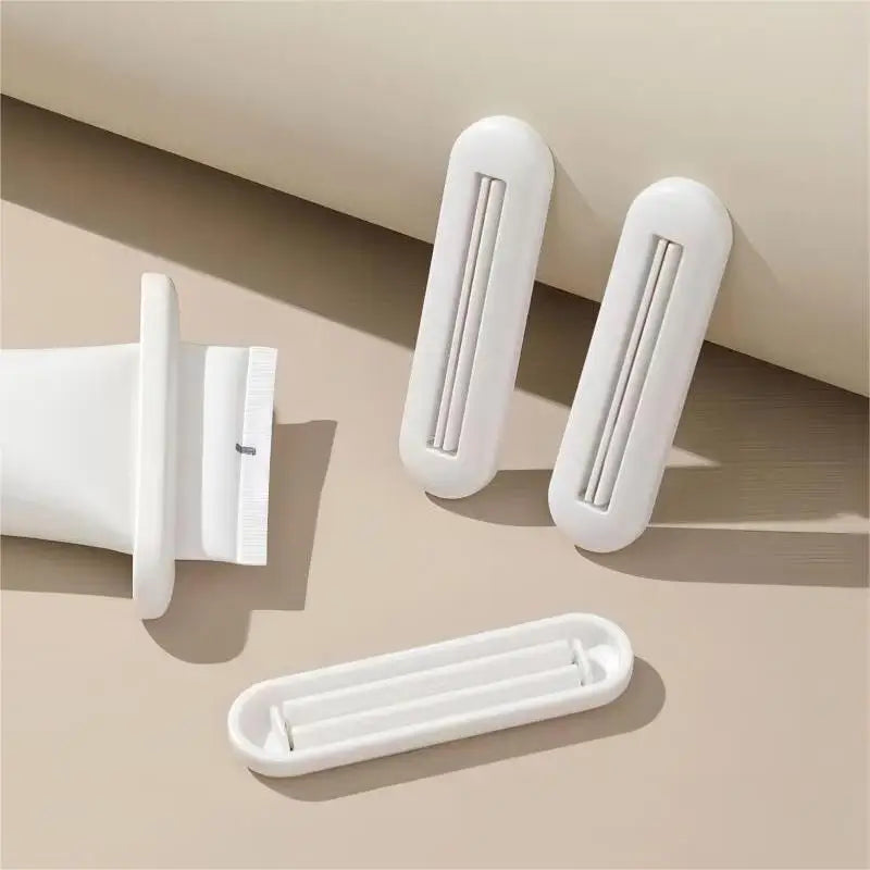 Toothpaste Squeezer, Toothpaste Clip, Facial Cleanser Hand Cream Squeezer, Household Manual Toothpaste Rolling Squeezer Qme