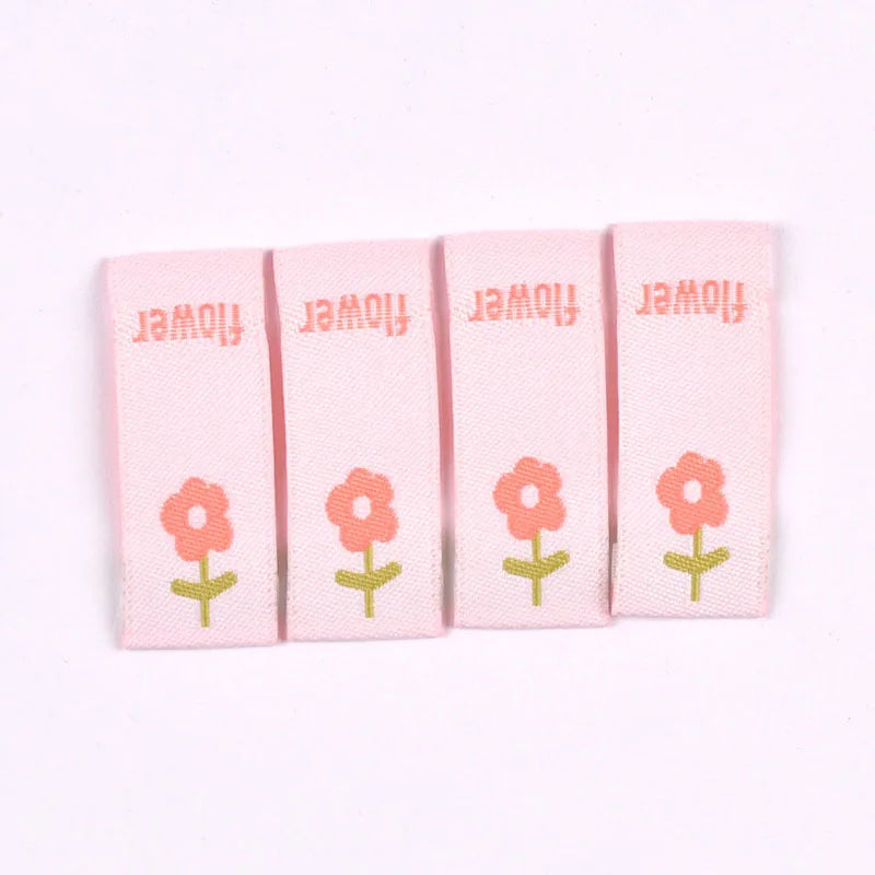 50pcs Cute Flower Embroidery Labels DIY Garment Accessories Handmade Clothing Bag Shoes Tags Kids Sewing Crafts 41x15mm c3630 Qme 5