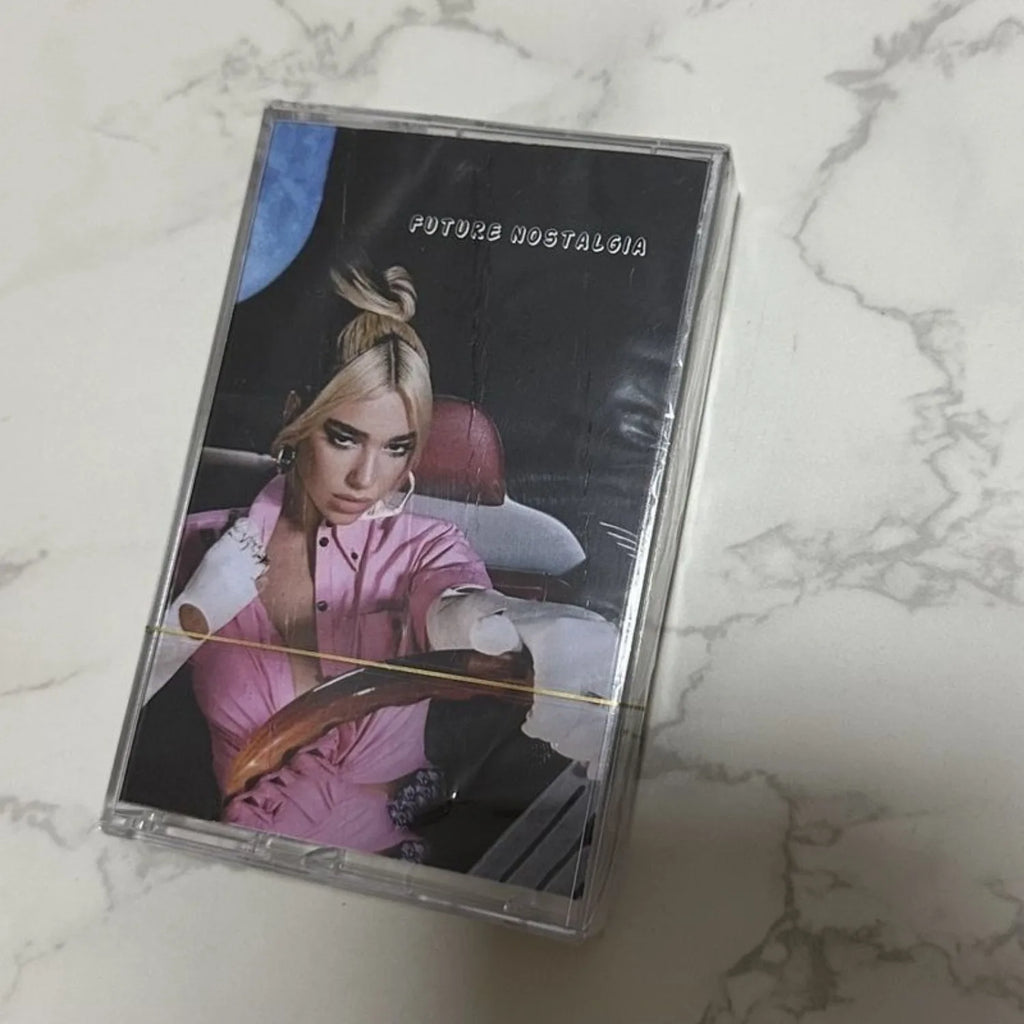 Contemporary Disco-Pop Revival Milestone Album Cassette, Retro-Futurist Aesthetic Cover, Ideal for Disco-Pop Collectors Qme disco-pop