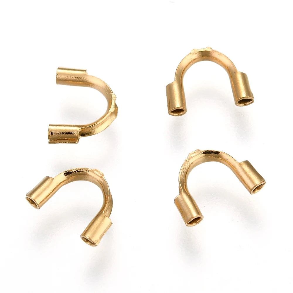 PandaHall 50pcs Ion Plating(IP) 316 Surgical Stainless Steel Wire Guardian, Golden, 6.3~7x4.5~5x1.5mm, Hole: 0.7mm Qme