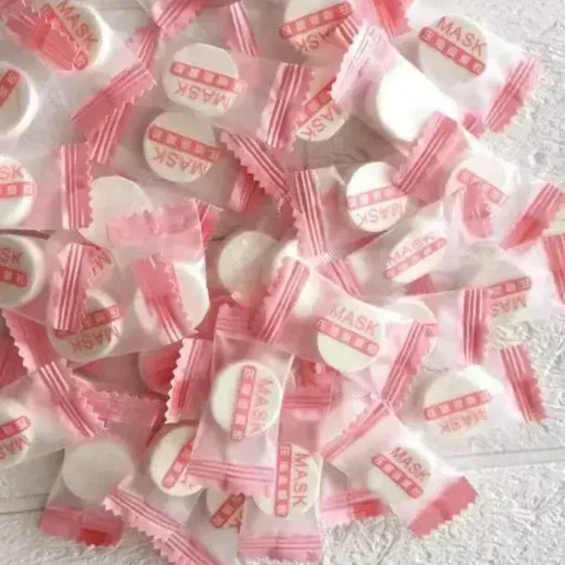 100pcs Disposable Compressed Facial Mask Portable Travel Non-woven Face Mask Skin Care Cotton Wrapped Masks Paper Qme Cotton MASK 100 PCS