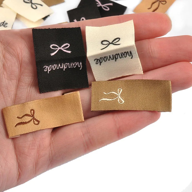 50pcs 15-38.5mm Rectangle Brown/White/Black Bow Label Embroideried Clothes Backpack Sewing Accessories Handmade Crafts c3784 Qme