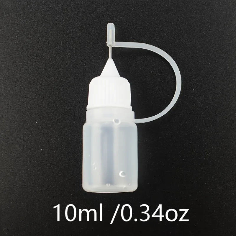 Plastic squeezable bottles, dropper bottles, ink bottles, glue bottles, dispensers, colored bottles, squeeze-fill bottles Qme