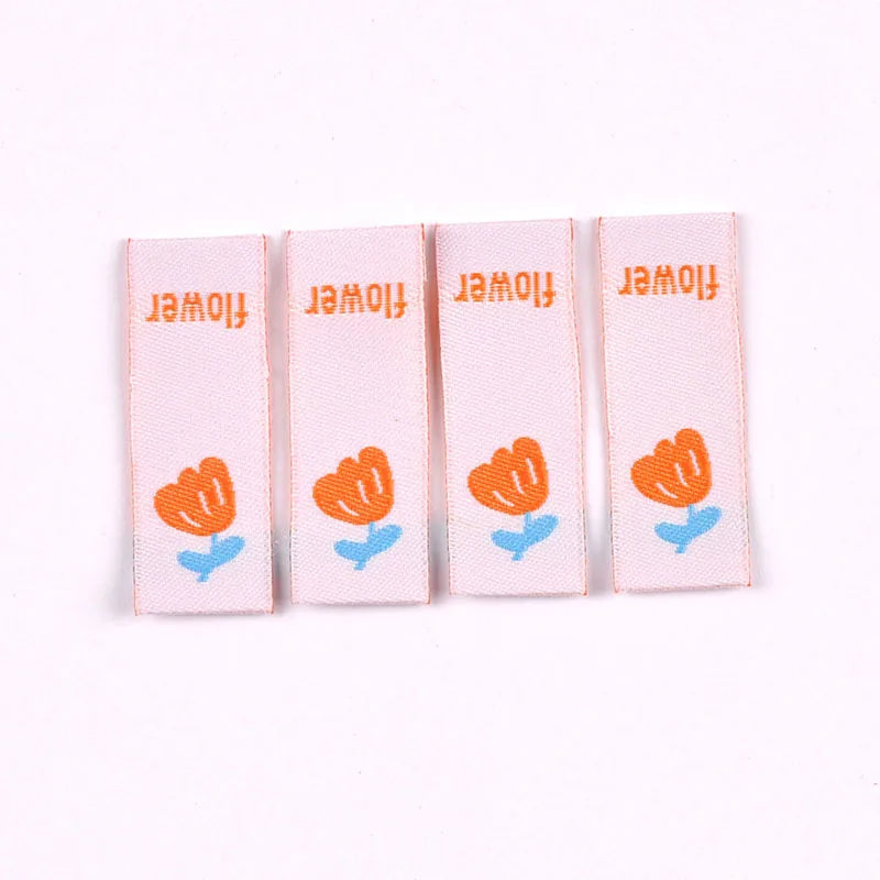 50pcs Cute Flower Embroidery Labels DIY Garment Accessories Handmade Clothing Bag Shoes Tags Kids Sewing Crafts 41x15mm c3630 Qme 2