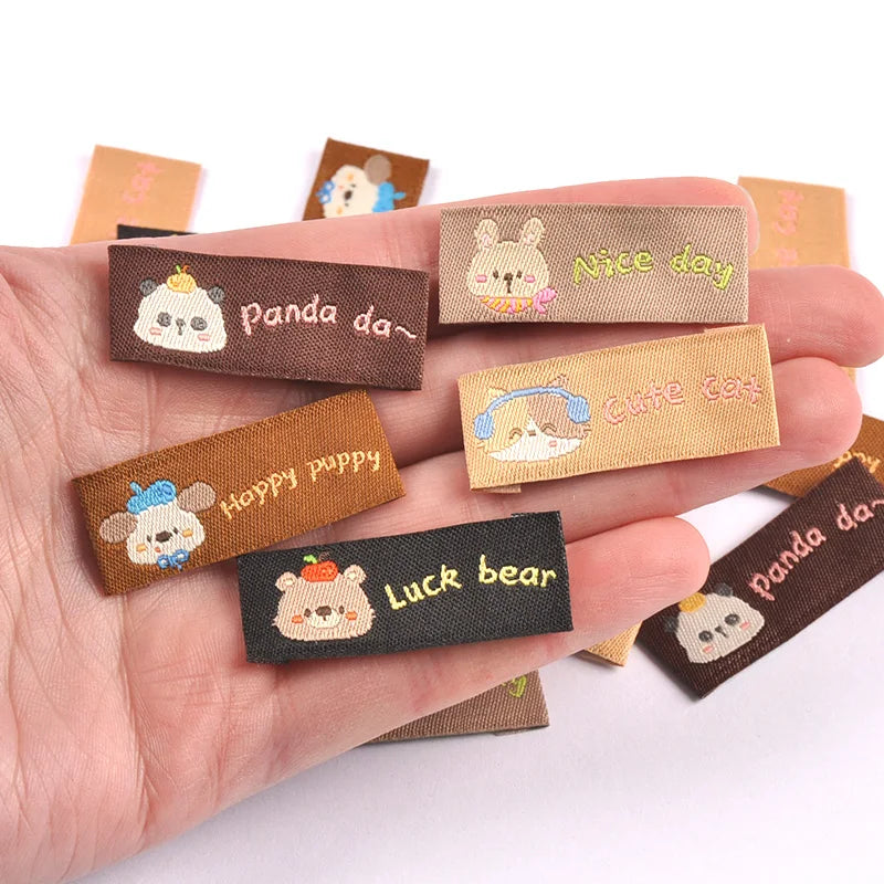 50Pcs Mix 40x17mm Cute Animal panda/dog/cat Fabric Labels Sew On Tags for DIY Clothes/Bag/Shoes Crafts cp4314 Qme
