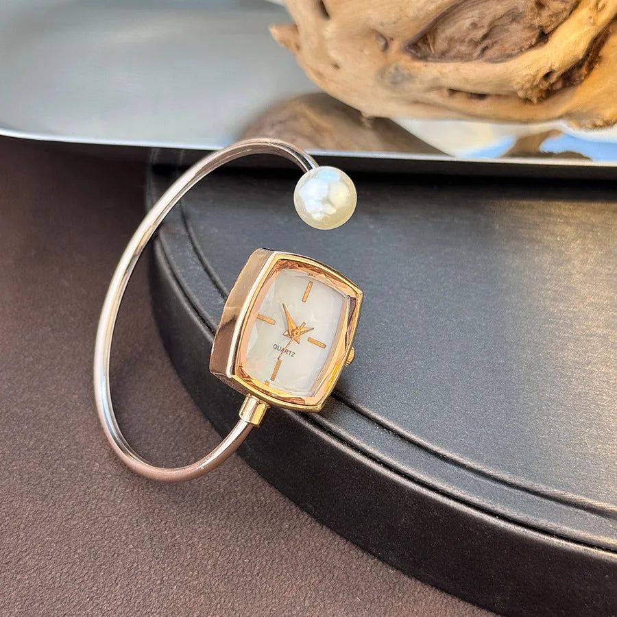 Simple and convenient to wear bracelet style wristwatch for women with high looks and fashion, square pearl watch for women Qme pearl rose gold