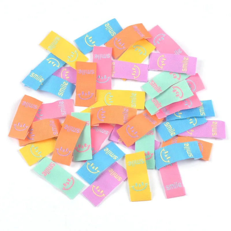 50Pcs Colorful Smile Embroidery Colth Labels Garment Washable Care Tags Sewing Accessories Crafts DIY Knitting Bag Shoe Supplies Qme