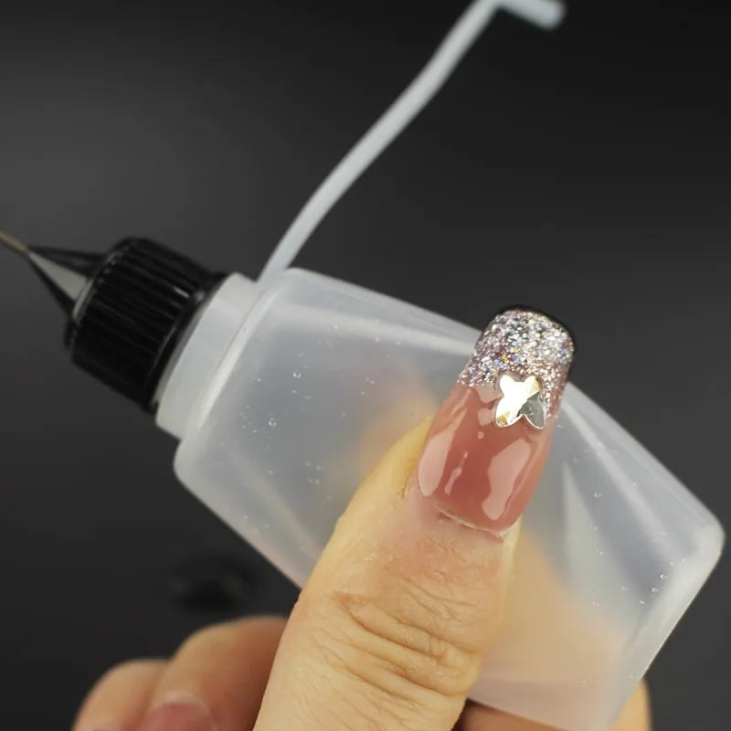 Plastic squeezable bottles, dropper bottles, ink bottles, glue bottles, dispensers, colored bottles, squeeze-fill bottles Qme