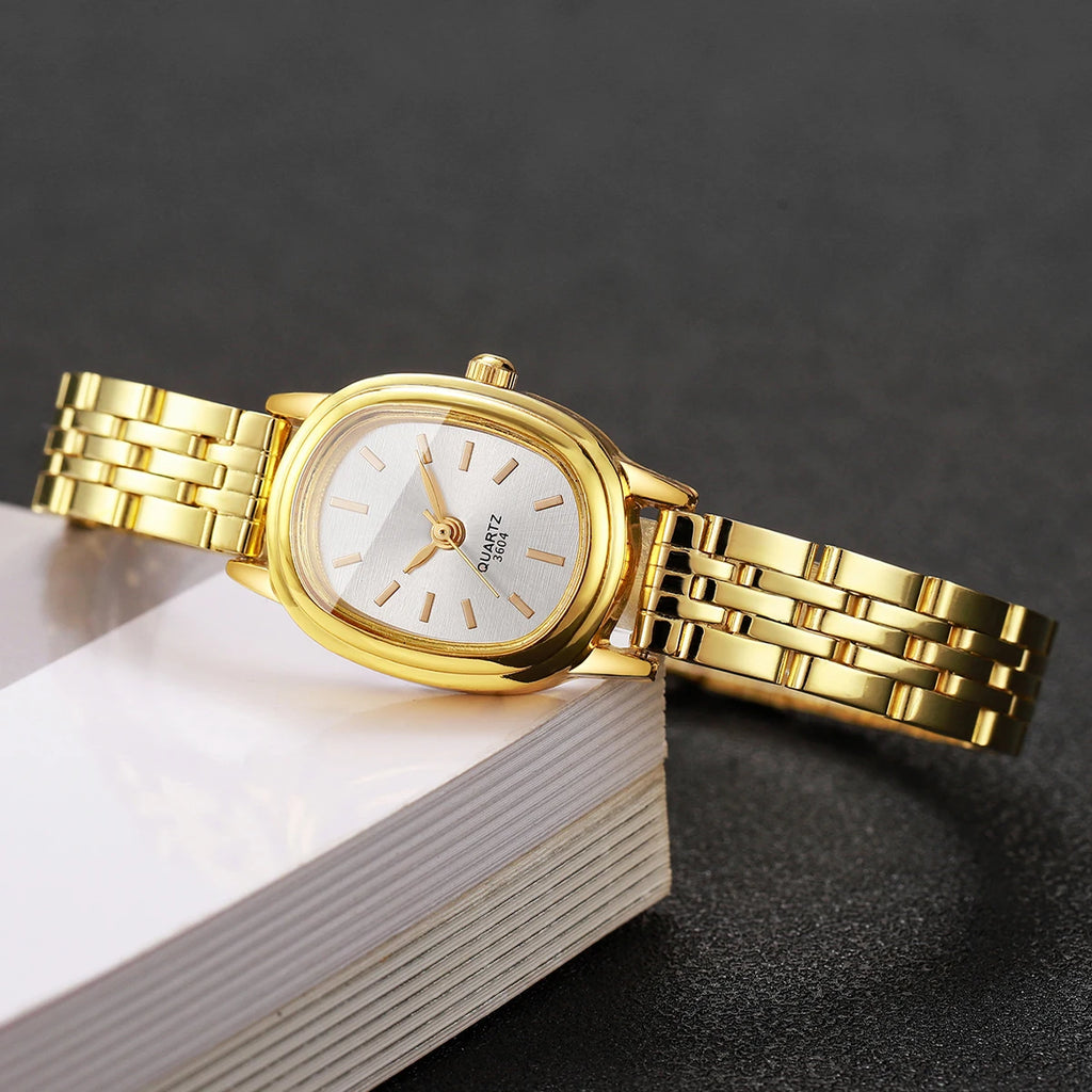 Golden oval thin steel strip women's simple strip scale retro small watch, no gift box included Qme
