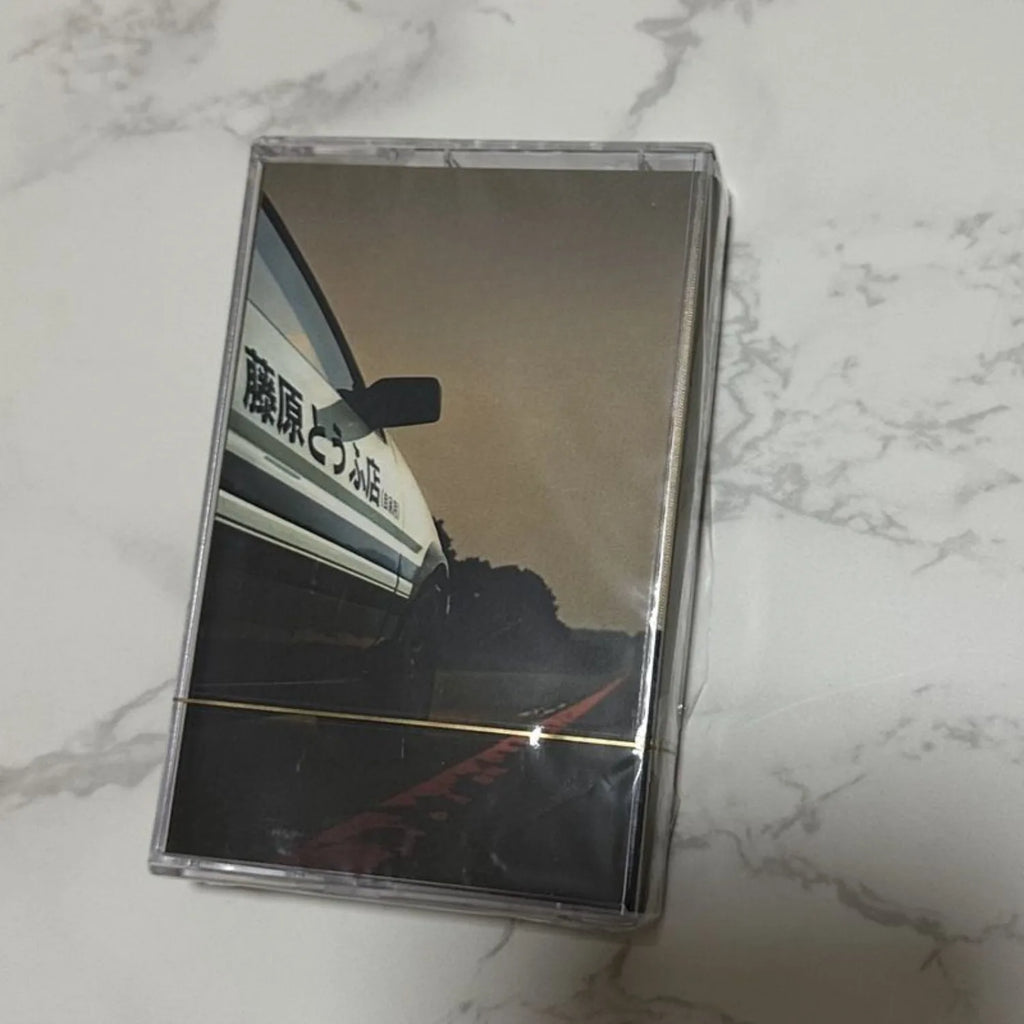 Classic Racing Anime Soundtrack Cassette Tape, Retro Nostalgic Format, High-Energy Theme Song Reissue, Ideal for Collectors Qme Soundtrack Cassette