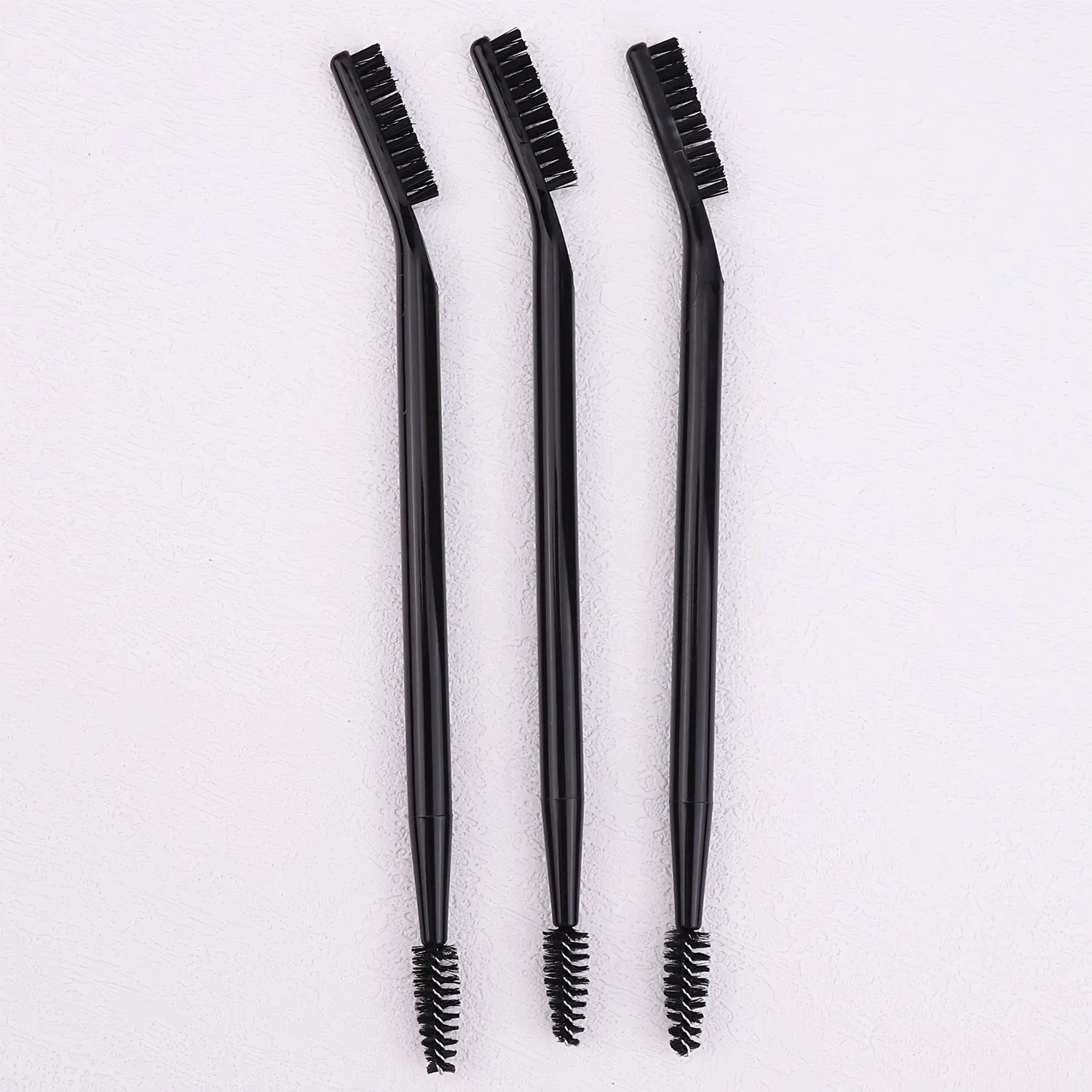 Double-ended eyelash curler combined with eyebrow brush, available in multiple colors, multi-functional makeup brush. Qme Black 1 pc
