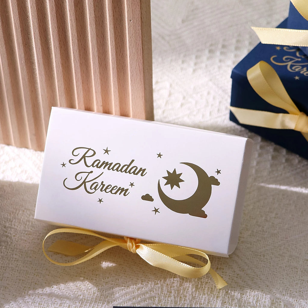 10 Rectangular Multi-Colored Gift Boxes with Gold Crescent and Planet Designs Printed on Them, Specifically Designed for Ramadan, and Adorned with Gold Ribbons — Perfect for Packaging Homemade Sweets, Premium Dates, and Sma Qme